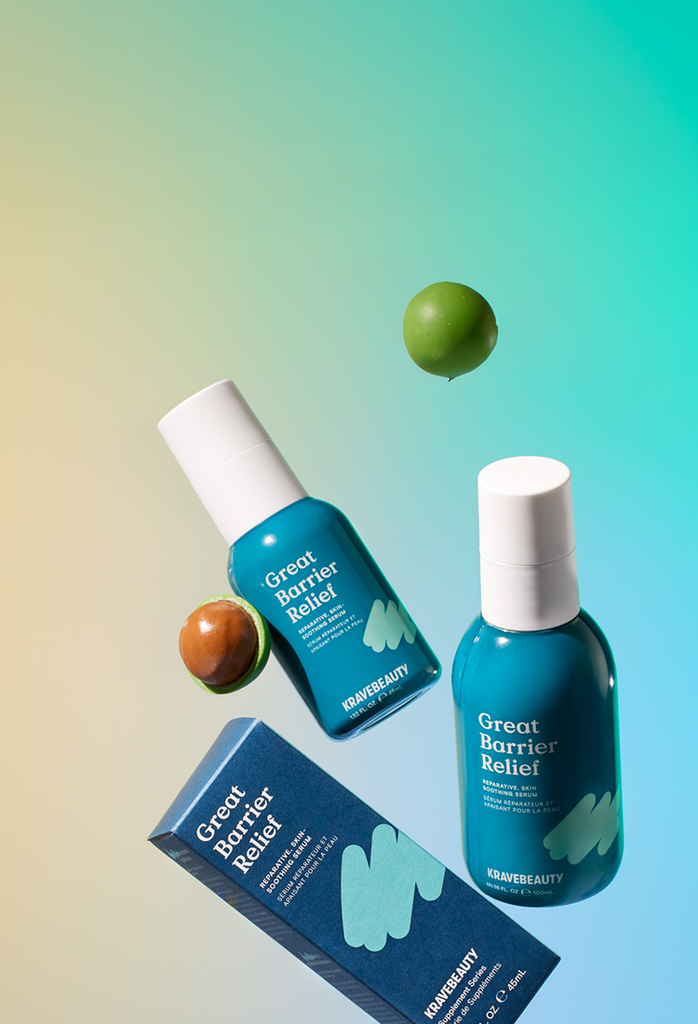 Two bottles and a box of 'Great Barrier Relief' with tamanu nut on a gradient background
