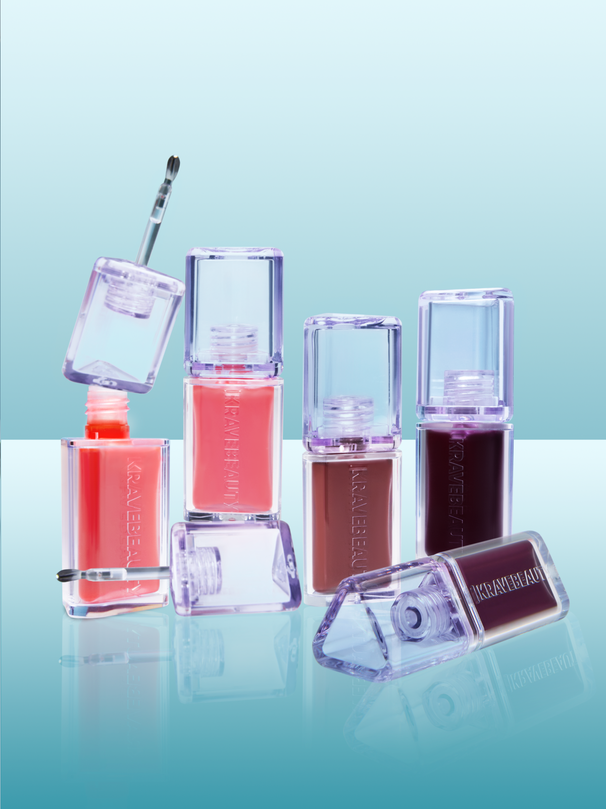 Plumptuous Lip Jelly available in 4 shades from left to right - Iced Persimmon, Guava Blush, Cherry Cola, and Acai Dream.